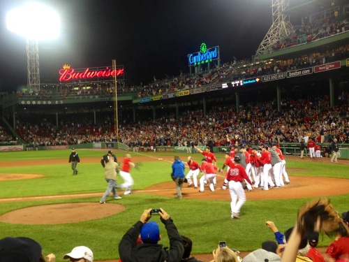 The team waits for Jonny Gomes after his winning homer against Tampa